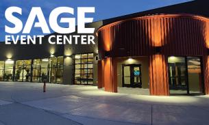 SAGE Event Center pictured at dusk with lights on